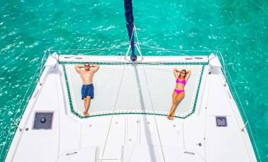 Couple on Moorings 5000 trampoline