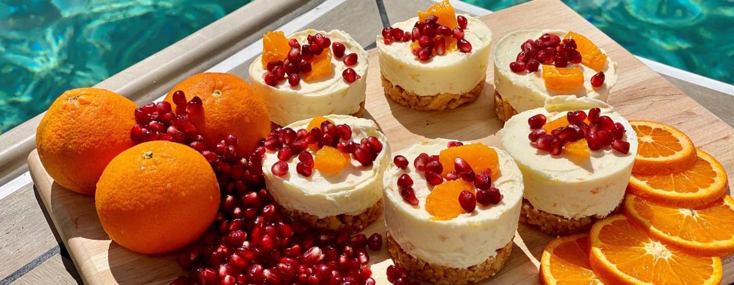 Mini cheesecakes with pomegranate and orange on board a Moorings 4500